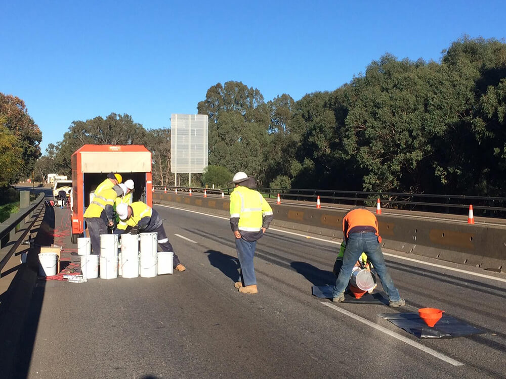 Highway construction top deck grouting